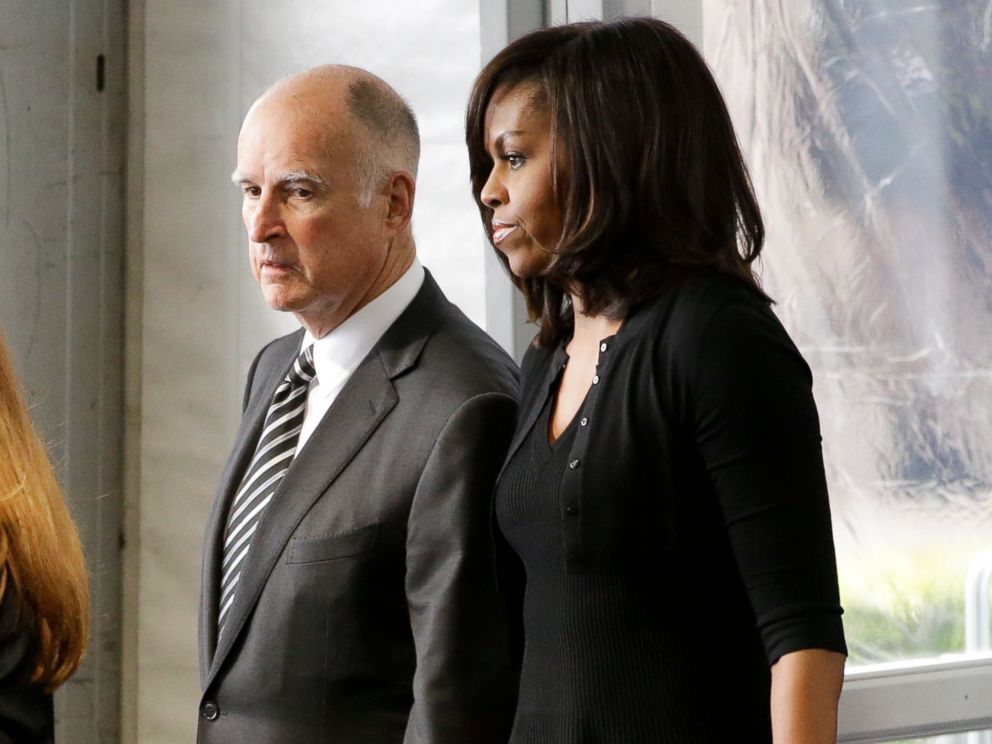 PHOTO: California Gov. Jerry Brown, left, and first lady Michelle Obama arrive at the funeral service for Nancy Reagan at the Ronald Reagan Presidential Library, March 11, 2016 in Simi Valley, Calif.