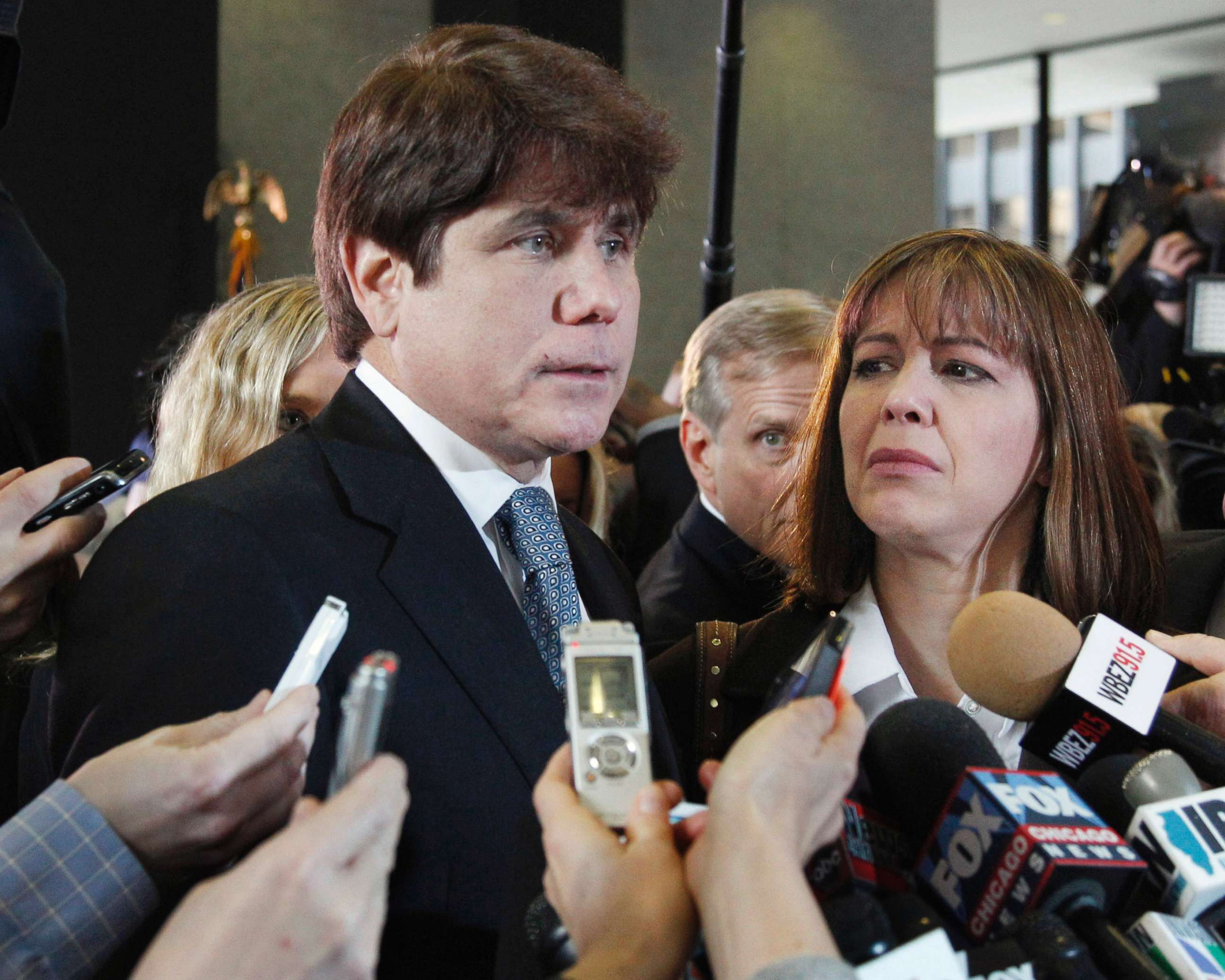 In this Dec. 7, 2011 file photo, former Illinois Gov. Rod Blagojevich speaks to reporters as his wife, Patti, listens at the federal building in Chicago.