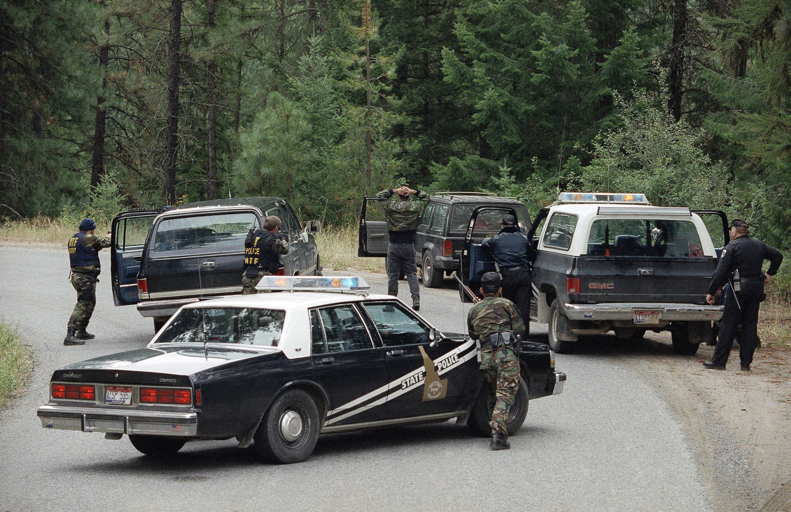 PHOTO: Agents of the Bureau of Alcohol Tobacco and Firearms and the Idaho State Patrol arrest people attempting to reach the Weaver's cabin three miles from the site of the four-day standoff with Randy Weaver on Aug. 25, 1992.