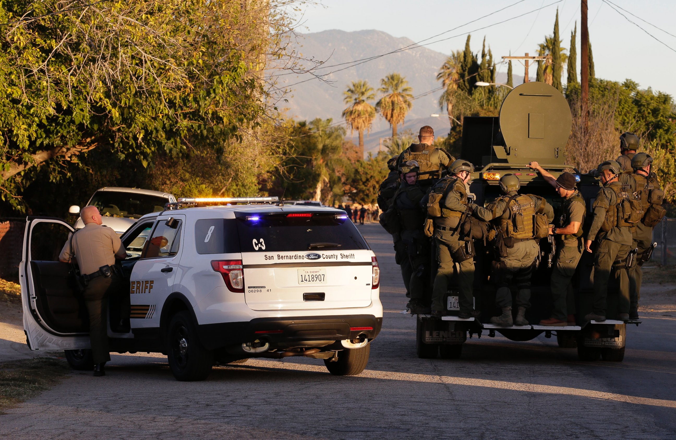 PHOTO: Law enforcement search for a suspect in a mass shooting that occurred at a Southern California social services center on Dec. 2, 2015, in San Bernardino, Calif. 