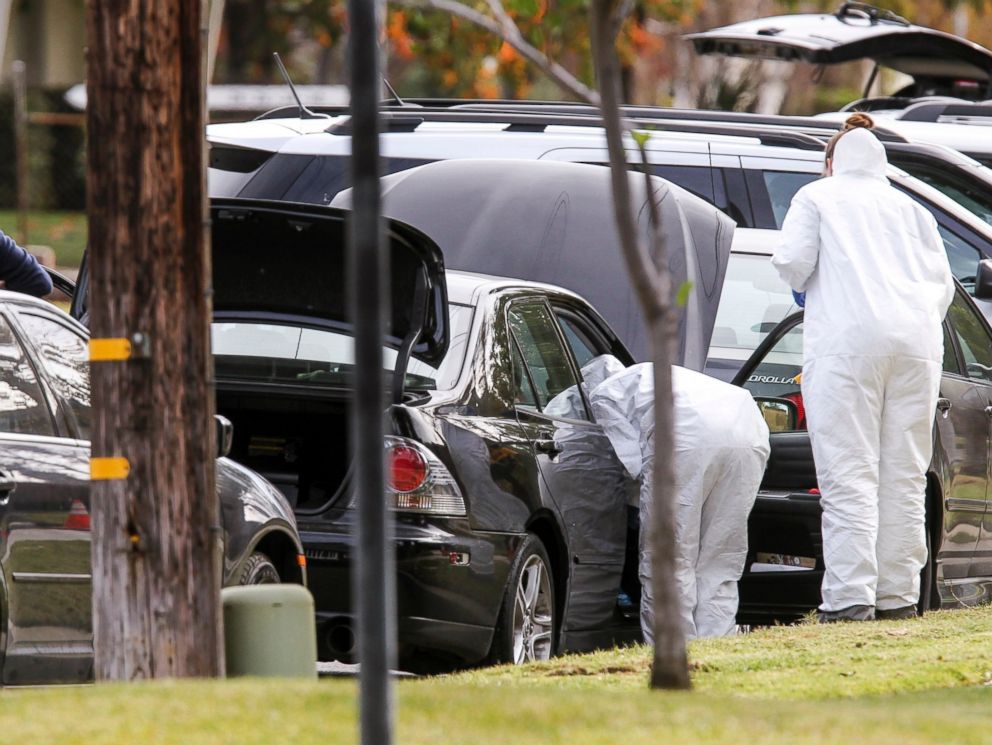 PHOTO: FBI agents investigate a car near a home in connection to the shootings in San Bernardino, Dec. 3, 2015, in Redlands, Calif.