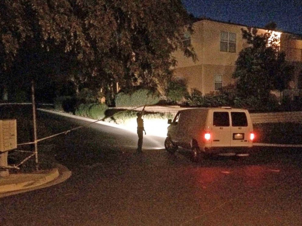 PHOTO: A sheriffs deputy lifts crime scene tape to allow a Coroners Bureau van to proceed up Greenhill Way as the Santa Barbara County Sheriffs Office opened a homicide investigation between Santa Barbara and Goleta, Calif., March 24, 2016.