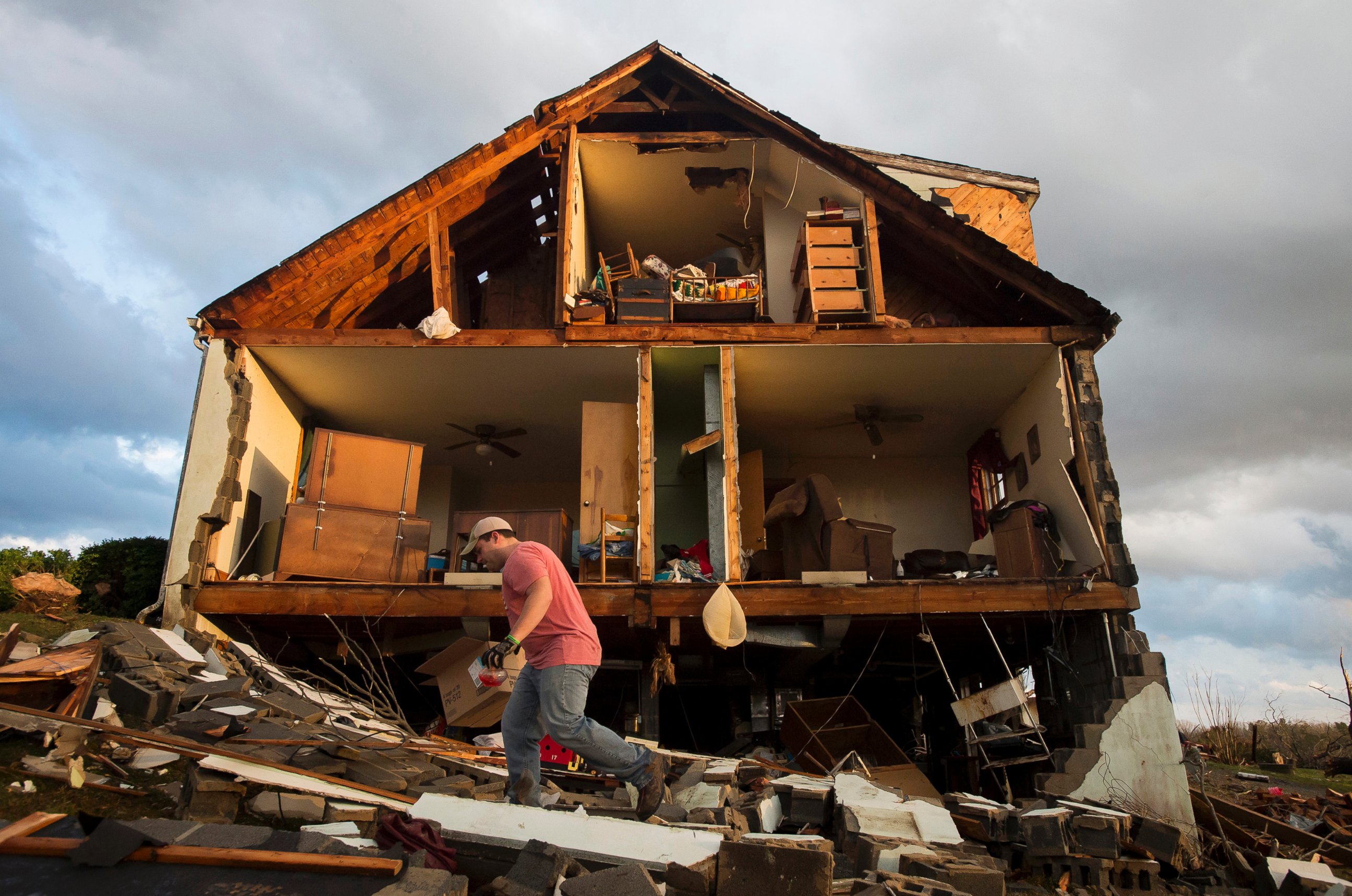PHOTO:Nick Mobley helps clean up a house owned by a family friend, Feb. 24, 2016, after a storm hit Appomattox County, Va.  