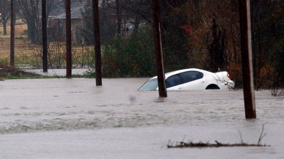 PHOTO:A car is seen submerged in water as days of heavy rain caused widespread flooding in Miami, Okla., Dec. 27, 2015.  