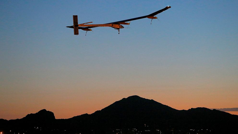 The Solar Impulse, piloted by André Borschberg, is shown taking flight, at dawn, from Sky Harbor International Airport in Phoenix, May 22, 2013. 