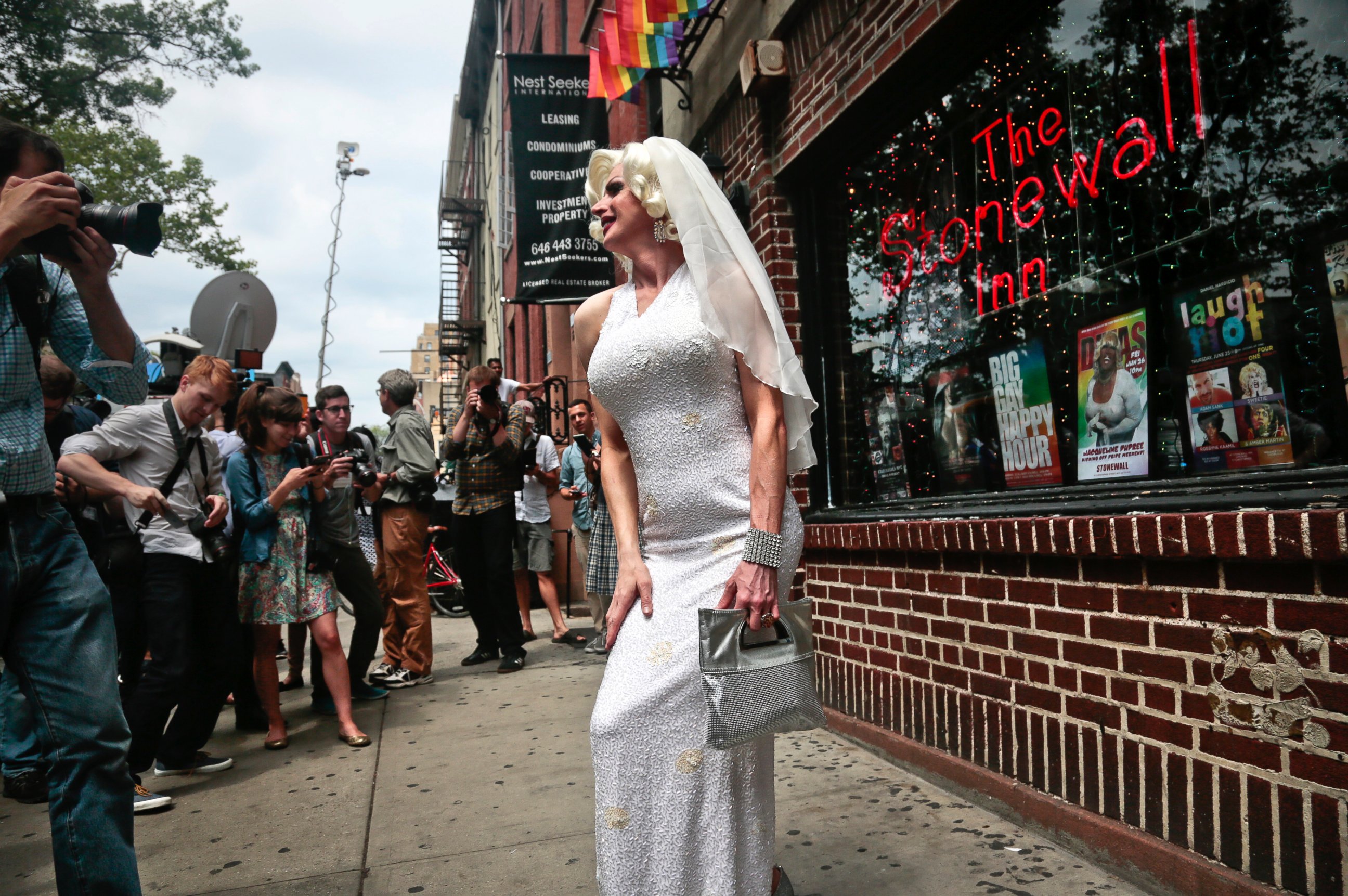 PHOTO: Carl McDonald, also known as Carllotta Gurl, pose in front of the Stonewall Inn, the iconic Greenwich Village bar credited as the birthplace of the gay rights movement, June 26, 2015, in New York.