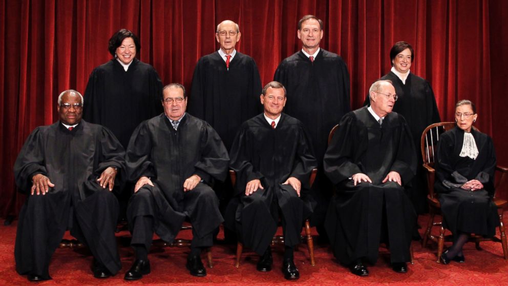 The Supreme Court justices pose for a group photo at the Supreme Court in Washington, Oct. 8, 2010. Seated, from left are, Justice Clarence Thomas, Antonin Scalia, Chief Justice John Roberts, Justice Anthony Kennedy, and Justice Ruth Bader Ginsburg. Standing, from left are, Justices Sonia Sotomayor, Stephen Breyer, Samuel Alito Jr., and Elena Kagan. 