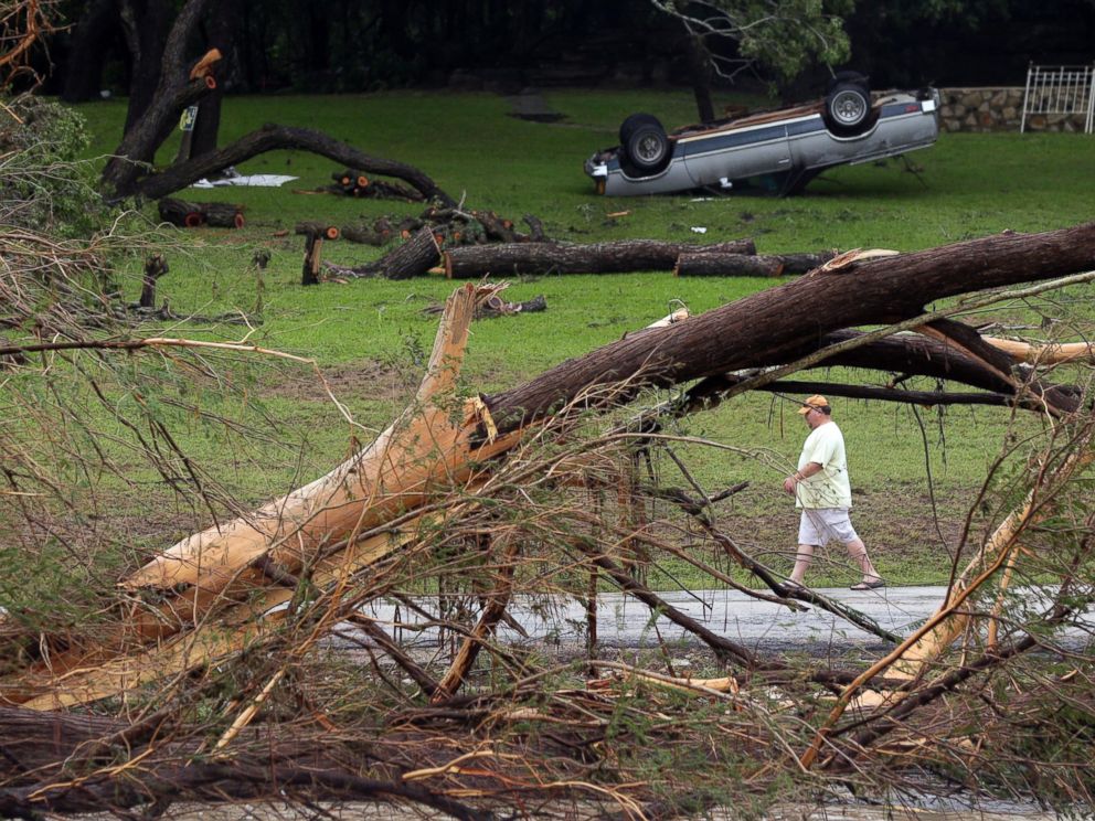 PHOTO: A man walks along the Blanco River