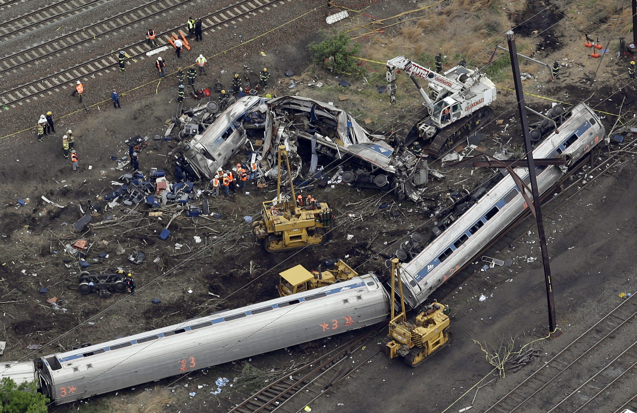 PHOTO: Emergency personnel work at the scene of a deadly train derailment in this May 13, 2015 file photo in Philadelphia.
