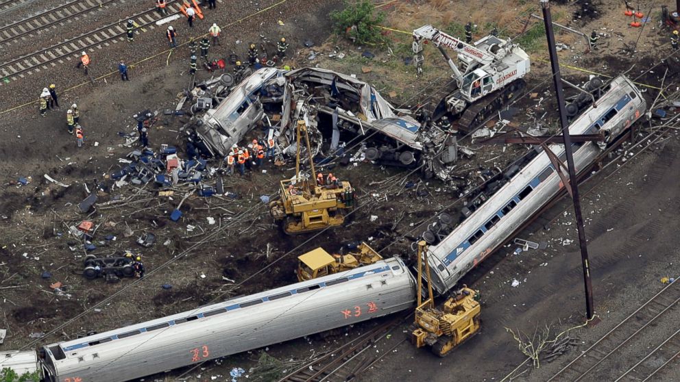 PHOTO: Emergency personnel work at the scene of a deadly train derailment in this May 13, 2015 file photo in Philadelphia.