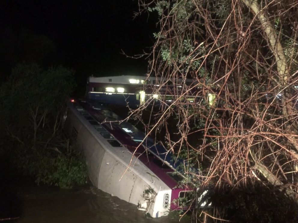 PHOTO:In this image provided the Alameda County Fire Department, first responders work the scene after a car of a commuter train plunged into Alameda Creek after the train derailed, March 7, 2016, in Alameda County, Calif.