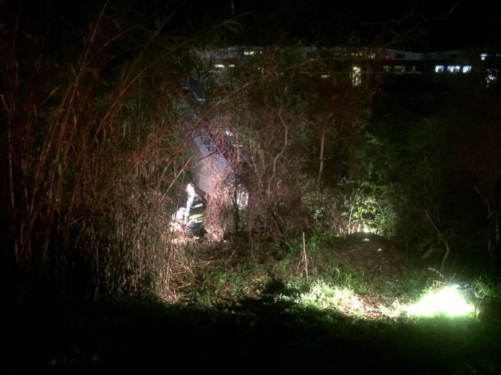 PHOTO:In this image provided the Alameda County Fire Department, first responders work the scene after a car of a commuter train plunged into Alameda Creek after the train derailed, March 7, 2016, in Alameda County, Calif.