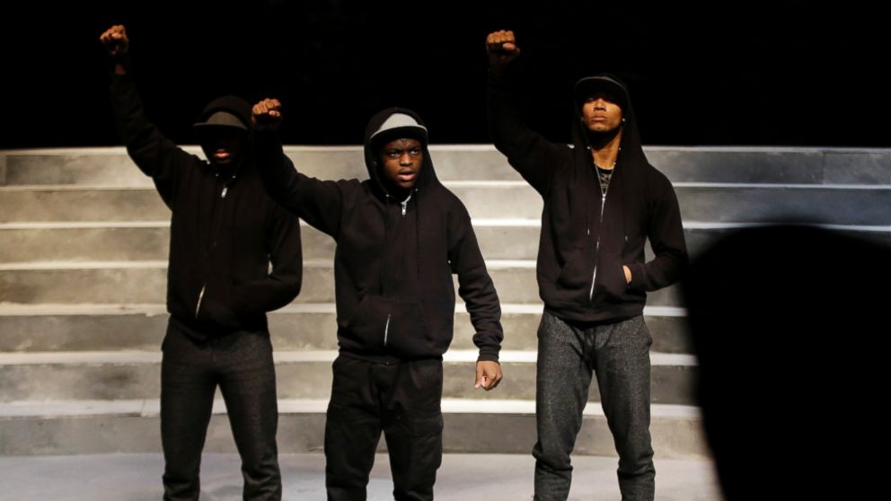 PHOTO: Stanley Morrison, from left, Amir Randall and Julian Darden act out a scene as director Rajendra Ramoon Maharaj watches during a rehearsal for The Ballad of Trayvon Martin in Philadelphia, May 10, 2016. The play opens Thursday.