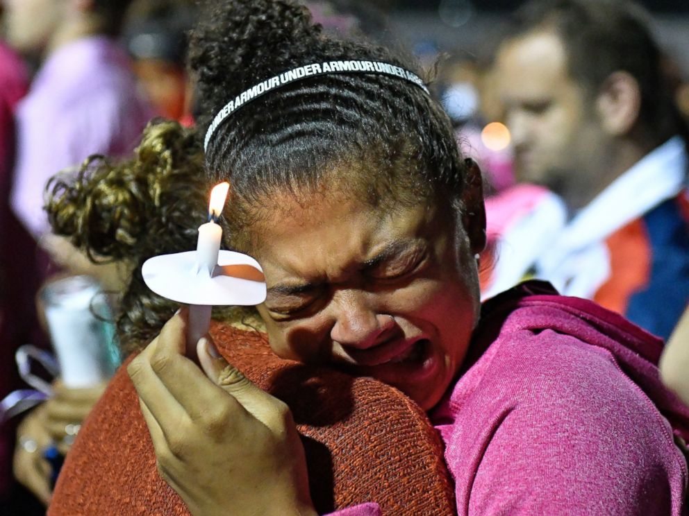 PHOTO: Classmates of Trinity Gay gather for a candlelight vigil at Lafayette High School, Oct. 17, 2016, in Lexington, Kentucky.