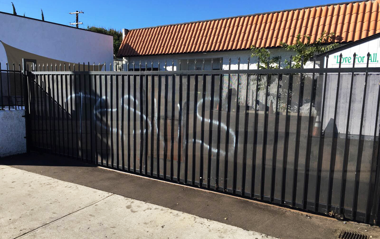 PHOTO:This photo provided by the Ahmadiyya Muslim Community muslimsforpeace.org shows "Jesus" in spray paint vandalizing a gate at the Ahmadiyya Muslim Community Baitus-Salaam Mosque in Hawthorne, Calif., Dec. 13, 2015.