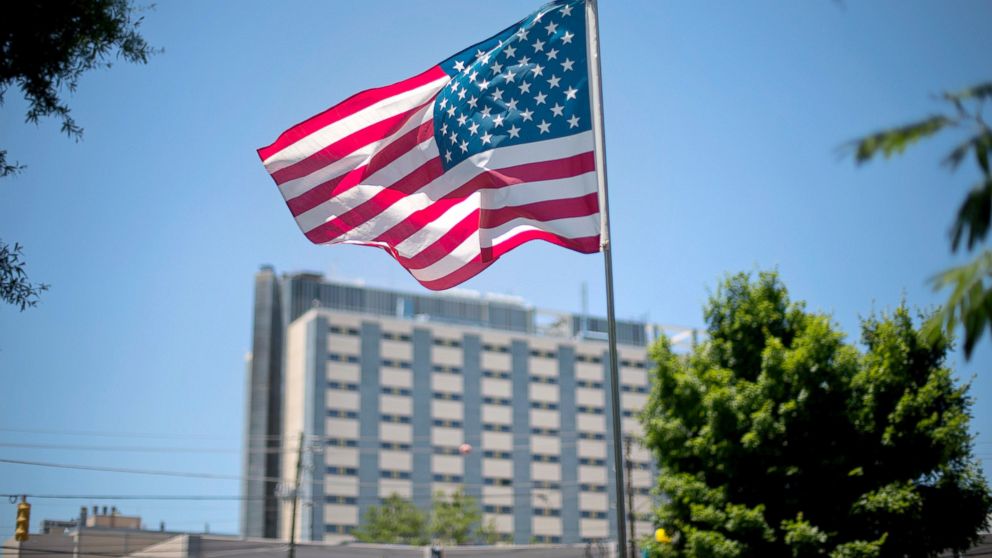 An American flag flies in front of the Atlanta VA Medical Center in Atlanta.