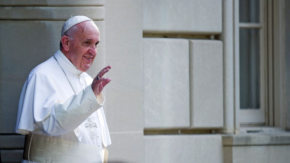 Pope Francis waves as he departs the Apostolic Nunciature, the Vatican's diplomatic mission in Washington,  Sept. 24, 2015, en route to the Capitol to address a joint meeting of Congress.   