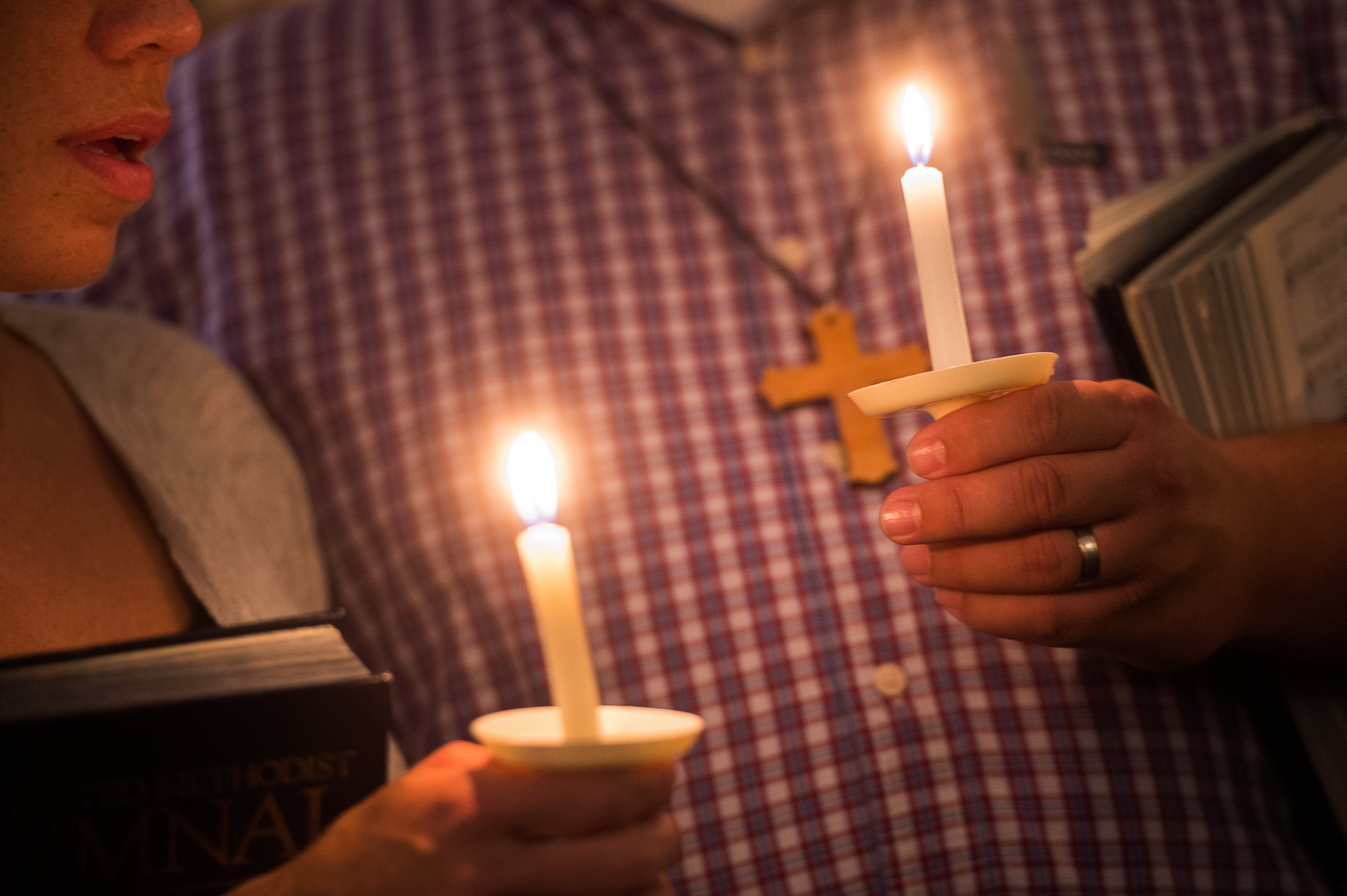 PHOTO: Community supporters light candles in the shape of a heart during a vigil for journalists Alison Parker and Adam Ward who were killed during a shooting in Moneta, Va., Aug. 26, 2015.