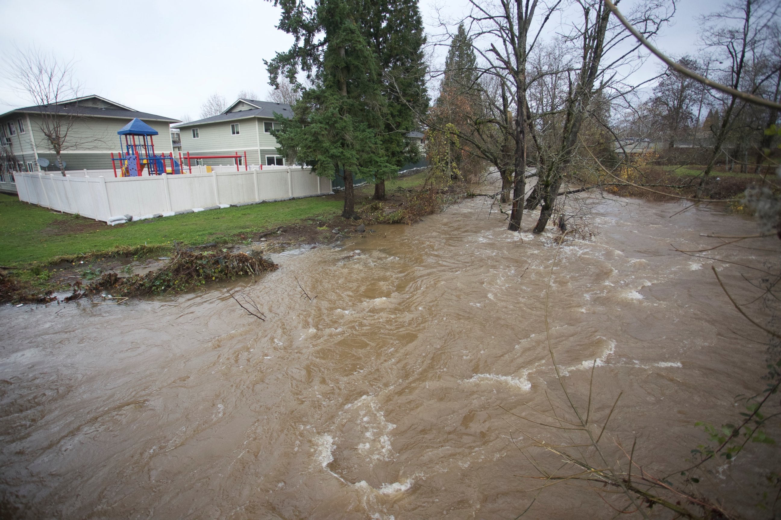 PHOTO:Johnson Creek swells near flood stage in Portland, Ore., as the Pacific Northwest was soaked by another night of heavy rain, Dec. 9, 2015.   