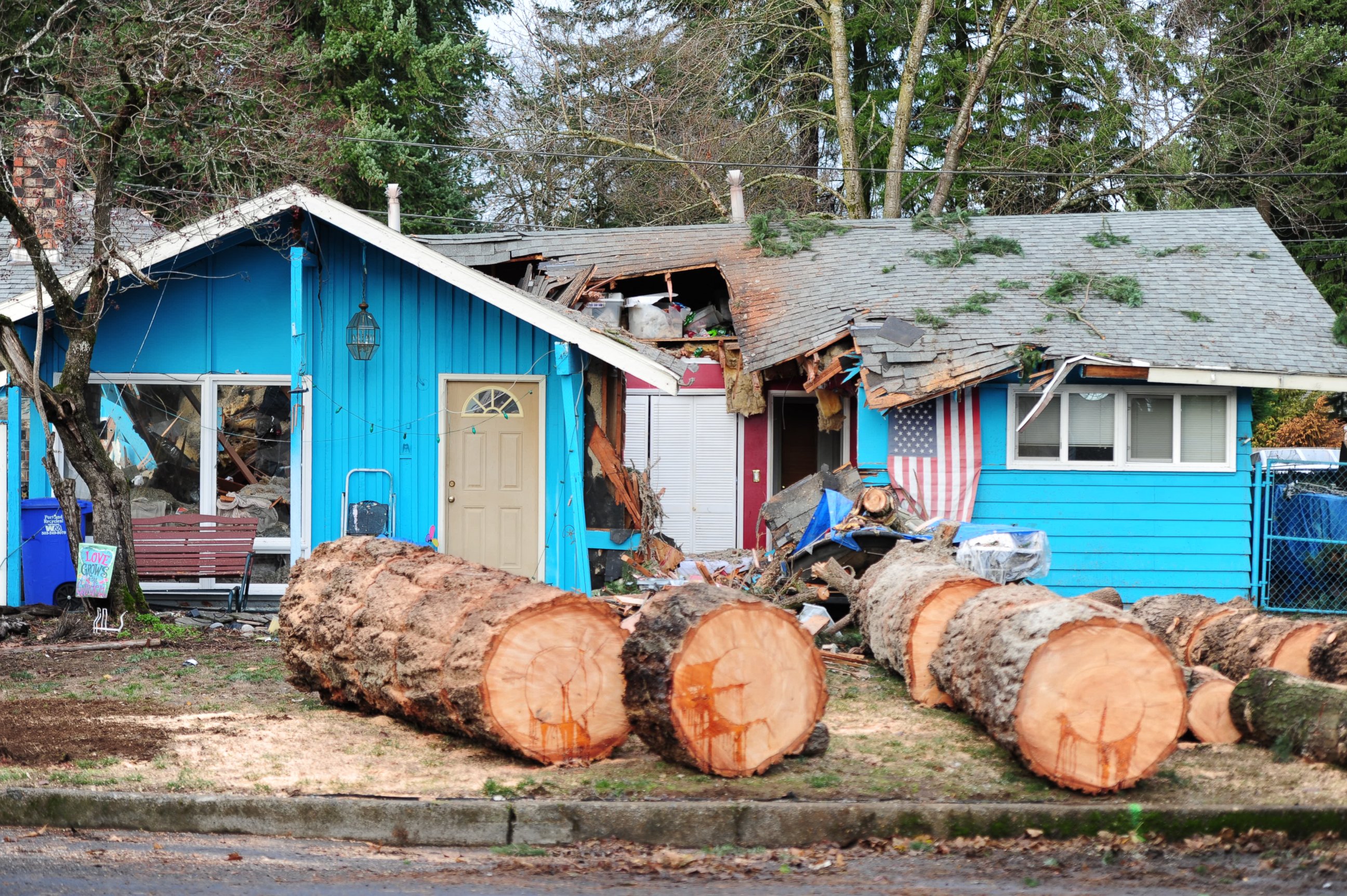PHOTO:A house in Southeast Portland, Ore., lies in ruins, Dec. 9, 2015, after a tree collapsed killing a 60-year-old woman in the early hours of the morning. Heavy rain and winds have battered the region causing widespread flooding and  power outages.  