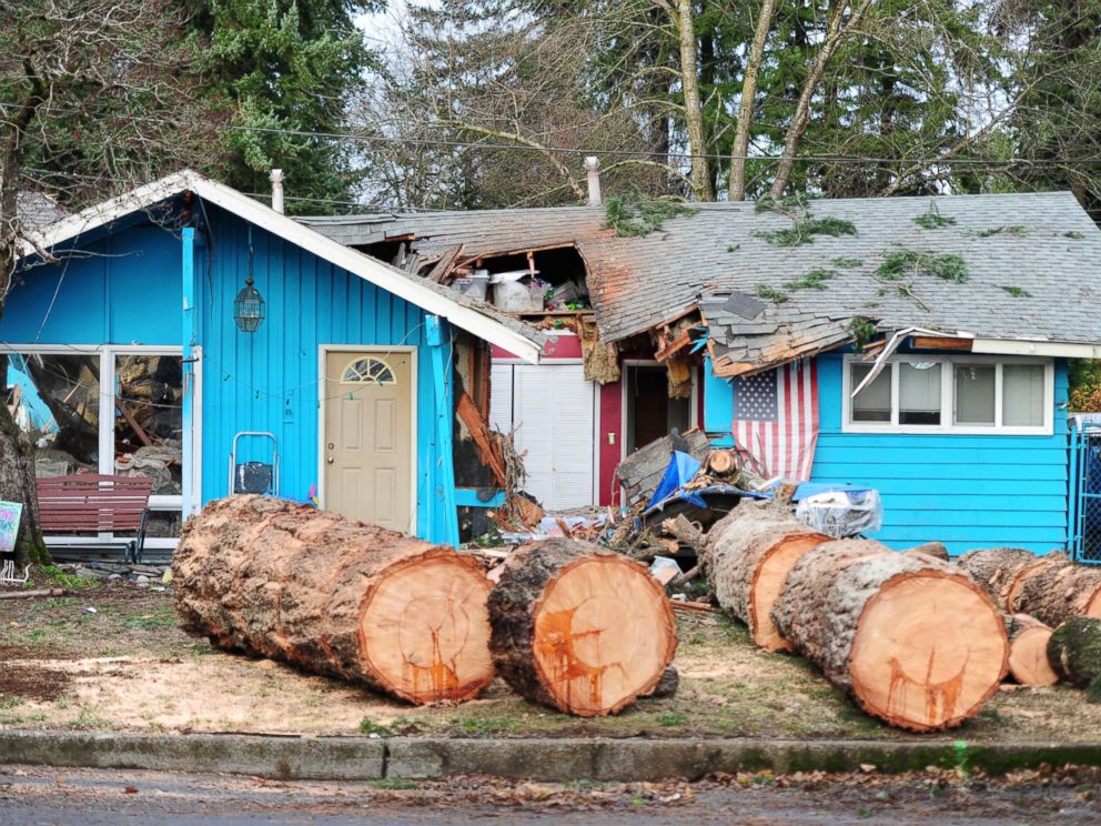 PHOTO:A house in Southeast Portland, Ore., lies in ruins, Dec. 9, 2015, after a tree collapsed killing a 60-year-old woman in the early hours of the morning. Heavy rain and winds have battered the region causing widespread flooding and power outages.