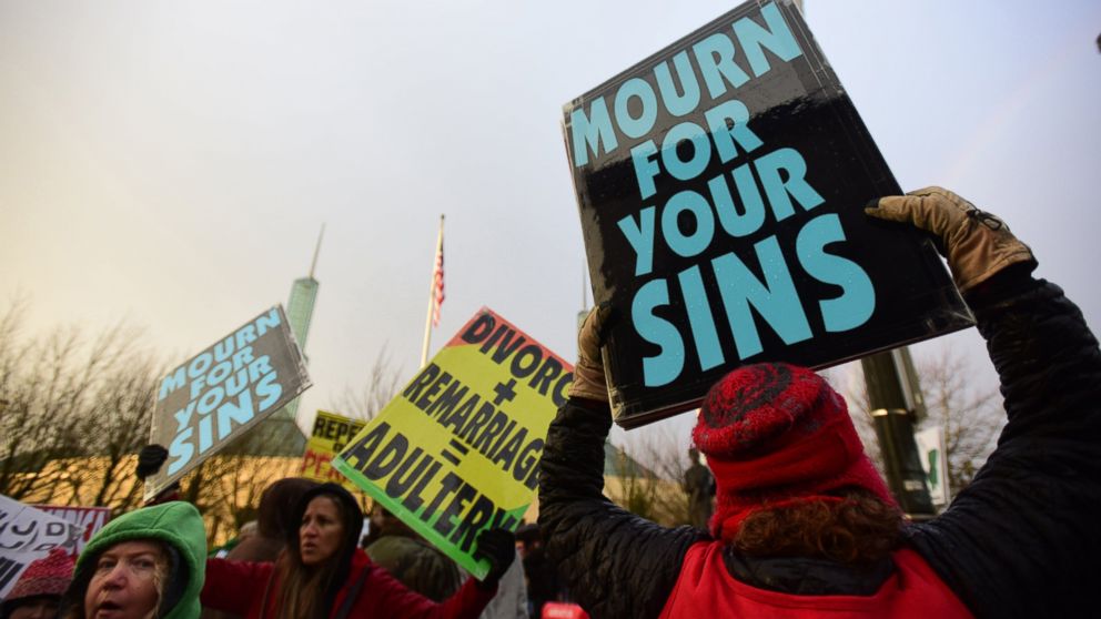 Westboro Baptist Church members take part in a picket outside of the Gay Christian Network Conference held at the Convention Center in Portland, Ore., Jan. 10, 2015.