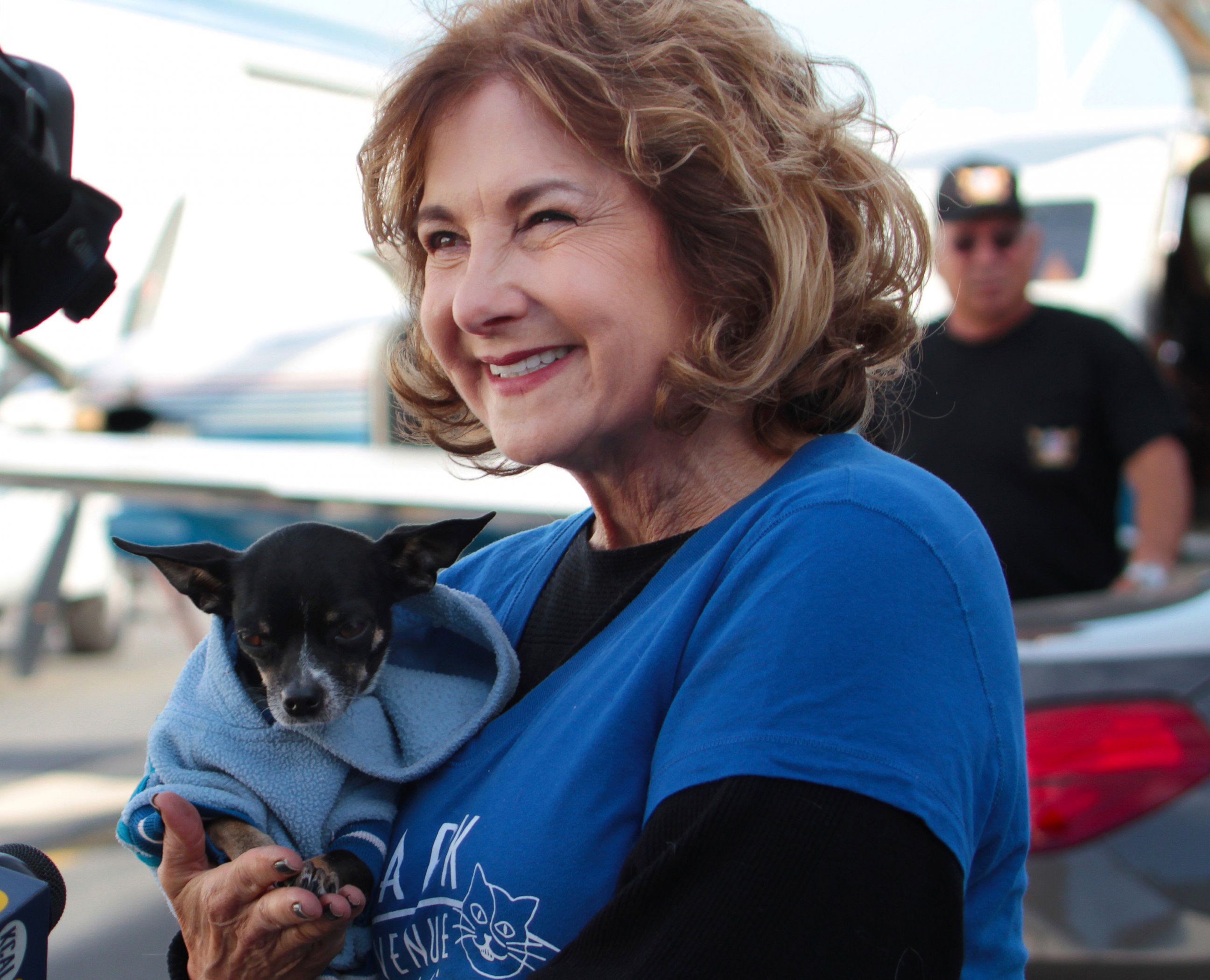 PHOTO: In this Nov. 22, 2014 photo provided courtesy of ShelterMe, volunteer Melanie Pozez loads rescued dogs into a Wings of Rescue plane to fly them to safe havens, at Van Nuys Airport, in Van Nuys, Calif.