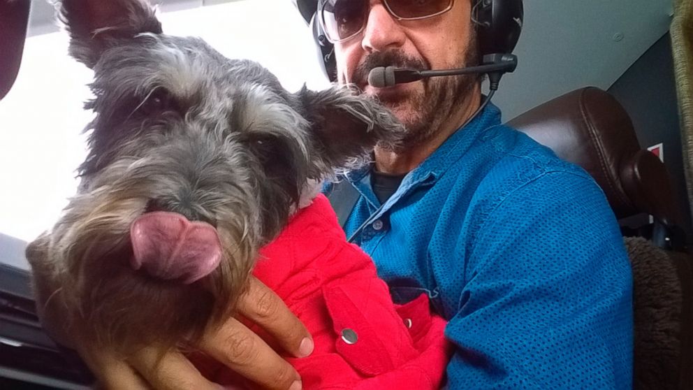 PHOTO: In this Dec. 5, 2014 photo provided courtesy of ShelterMe, volunteer Jim Nista delivers Finn, a rescued dog, in Everett, Wash. 