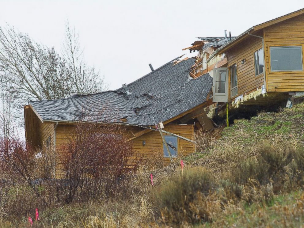 PHOTO: A house breaks apart as a slow-moving landslide in Jackson, Wyo. advances downhill on Friday, April 18. 2014.