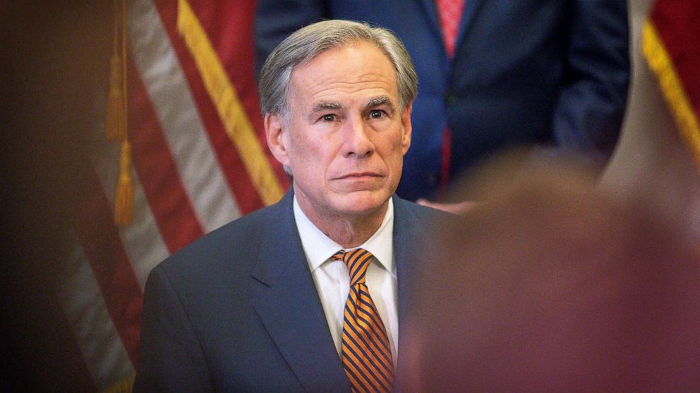 PHOTO: Texas Governor Greg Abbott attends a press conference where he signed Senate Bills 2 and 3 at the Capitol, June 8, 2021, in Austin, Texas. 
