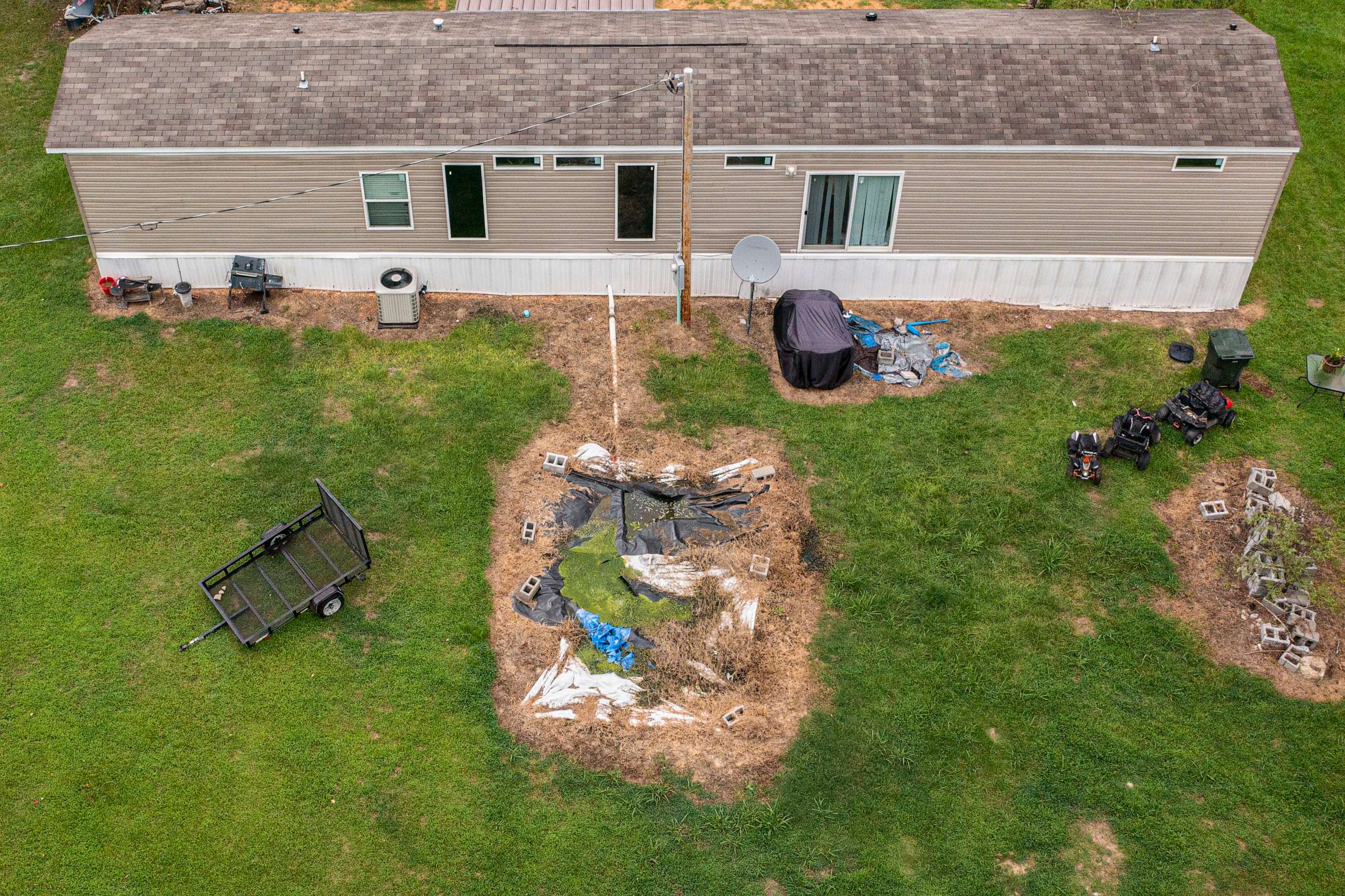 PHOTO: The failing septic tank buried behind Mautree Burke's home causes sewage to rise to the surface of her backyard.