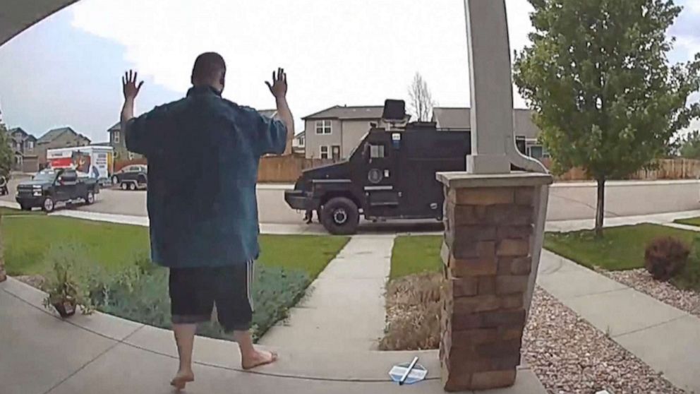 PHOTO: In this image from video provided by Leslie Bowman, Anderson Lee Aldrich surrenders to police at a home where his mother, Laura Voepel, was renting a room in Colorado Springs, Colo., June 18, 2021. 