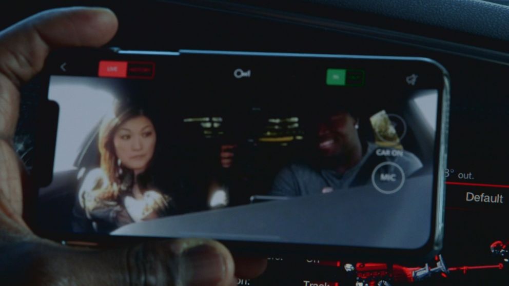 PHOTO: Carolina Panthers fullback Alex Armah shows Nightline's Juju Chang the small security camera on the dashboard of his treasured Dodge Charger.