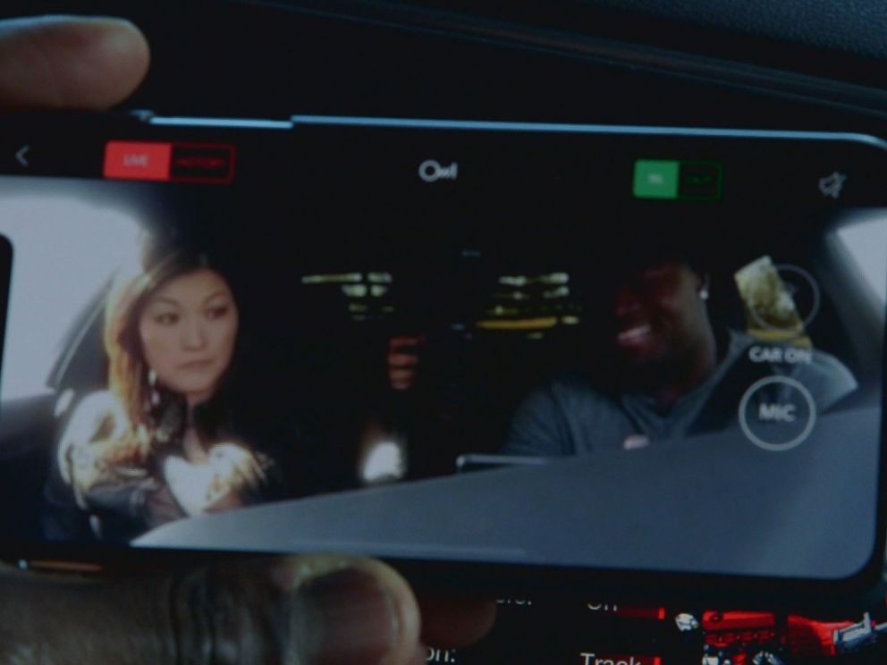 PHOTO: Carolina Panthers fullback Alex Armah shows Nightlines Juju Chang the small security camera on the dashboard of his treasured Dodge Charger.