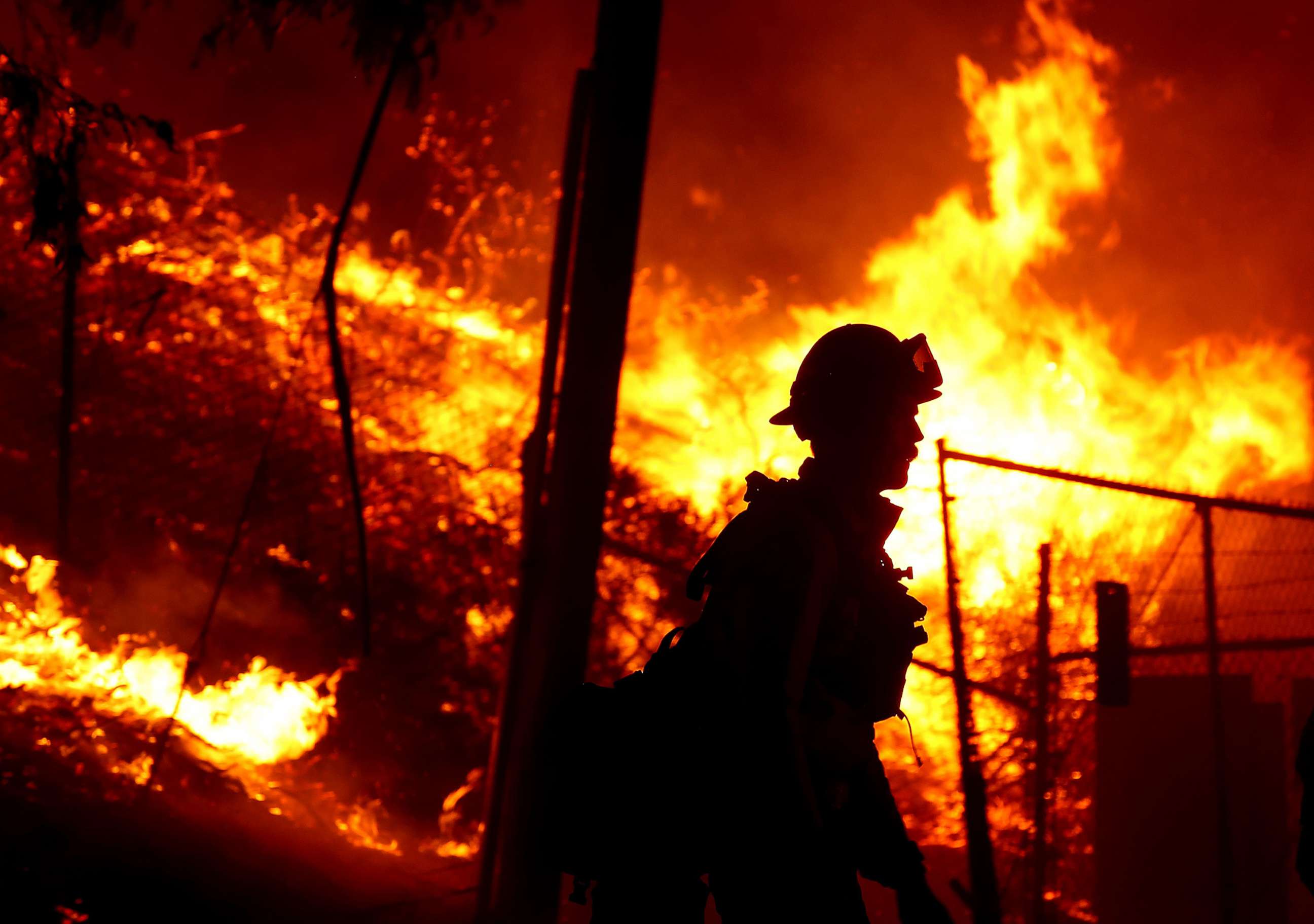 PHOTO: A firefighter battles the Alisal fire along the 101 Freeway near Goleta, Calif., Oct. 12, 2021. 