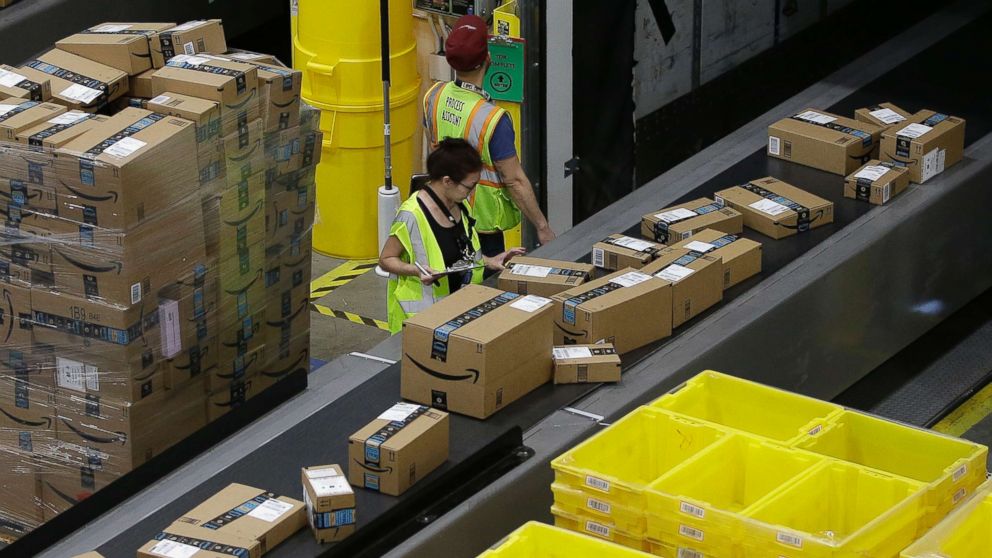 PHOTO: Packages move down a conveyor system to the proper shipping area at the new Amazon Fulfillment Center in Sacramento, Calif. on Feb. 9, 2018.