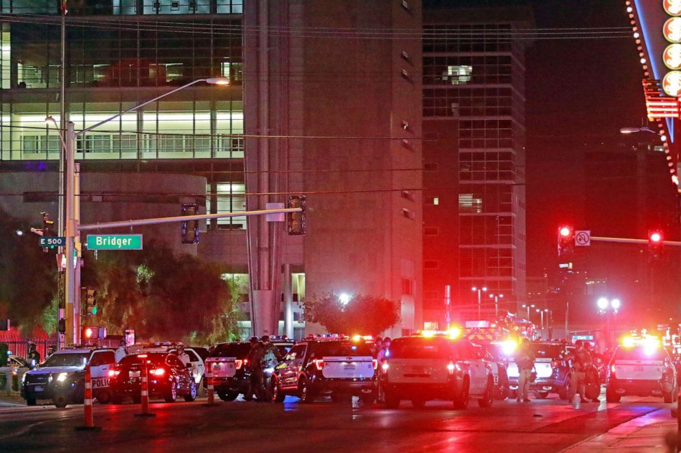 PHOTO: Police and rescue workers swarm the intersection outside Lloyd D. George Federal Courthouse, where shots were fired late Monday, June 1, 2020, in downtown Las Vegas.