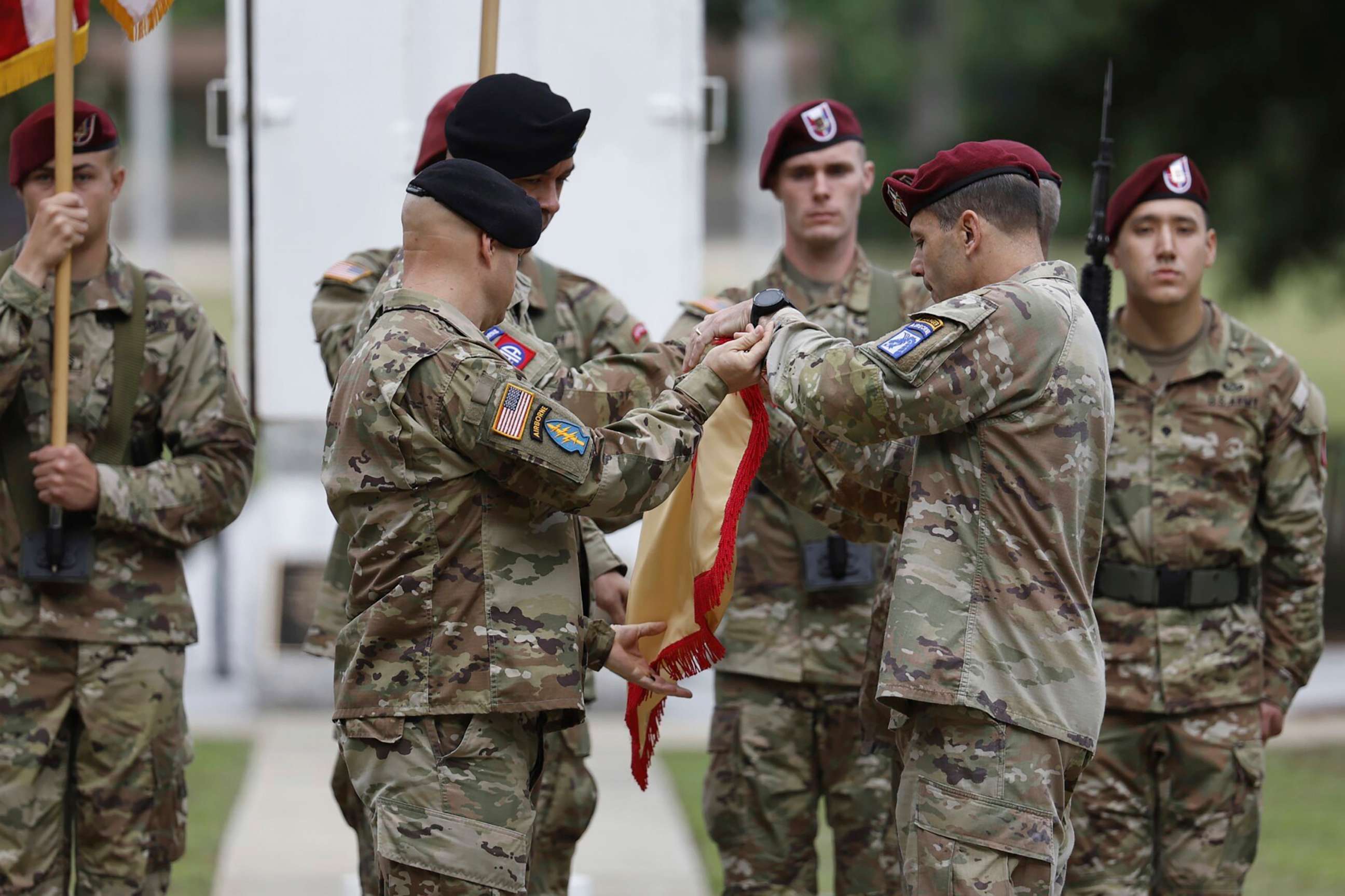 PHOTO: Lieutenant General Christopher T. Donahue, right, takes part of the Casing of the Colors during a ceremony to rename Fort Bragg, June 2, 2023 in Fort Bragg, N.C.