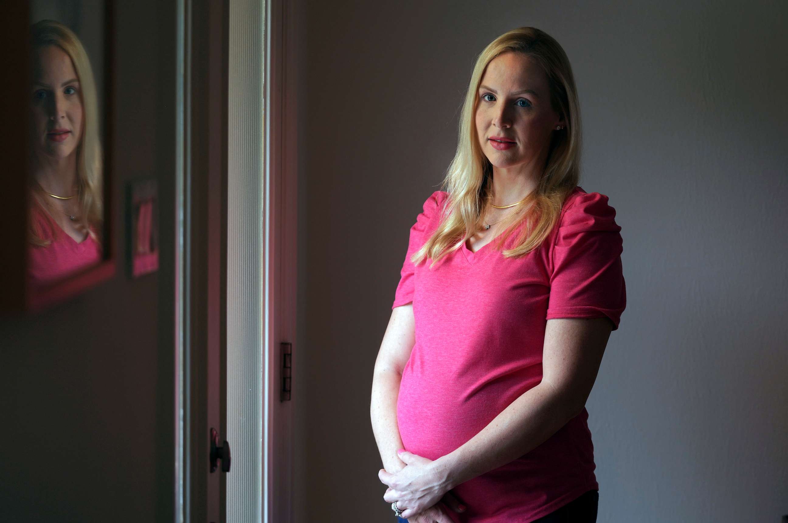 PHOTO: Dr. Austin Dennard poses for a photo at her home in Dallas, May 18, 2023.