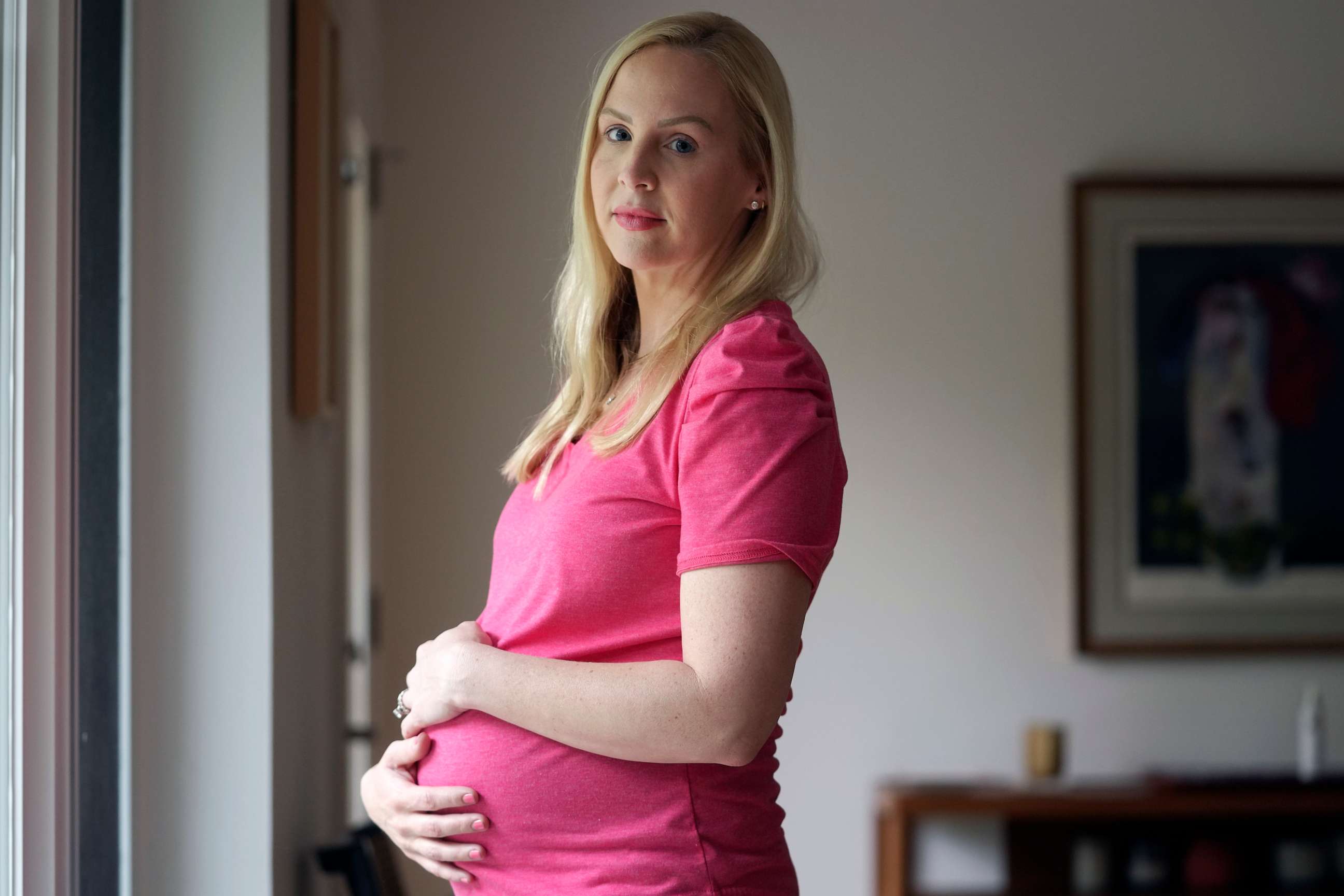 PHOTO: Dr. Austin Dennard poses for a photo at her home in Dallas, May 18, 2023.