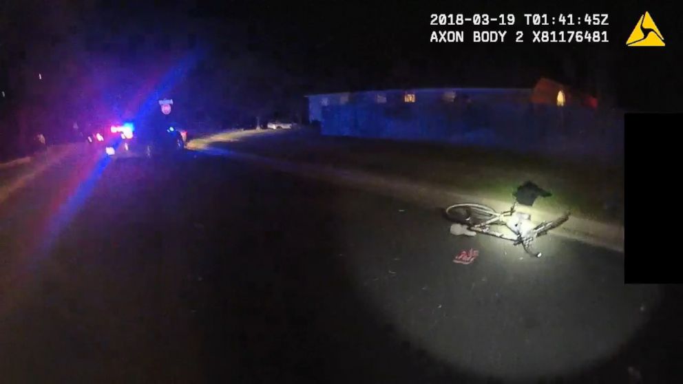PHOTO: Video from body cameras worn by Austin police officers show where two men were injured from an explosive triggered by a tripwire, concealed by a red sign