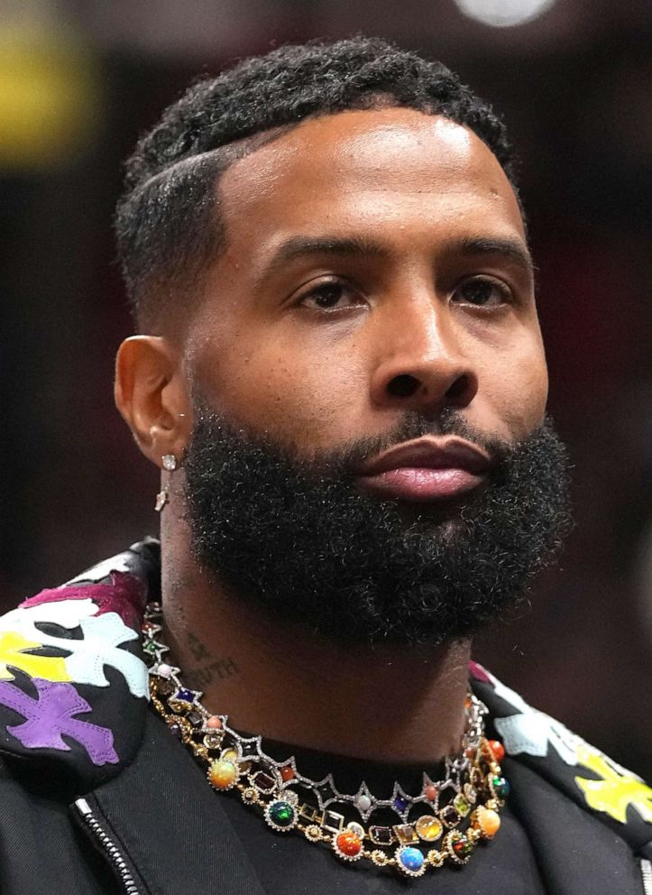 PHOTO: Odell Beckham Jr. walks court-side at the Miami Heat and the Washington Wizards NBA game, Nov 23, 2022, in Miami. 