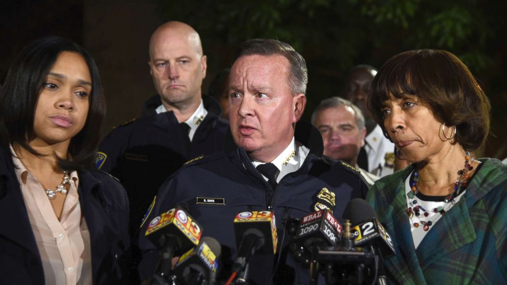 PHOTO: Police commissioner Kevin Davis, center, talks to the press after a police officer was shot, as State's Attorney for Baltimore Marilyn Mosby, left, and Baltimore Mayor Catherine Pugh, right, stand nearby, Nov. 15, 2017, in Baltimore, Md.
