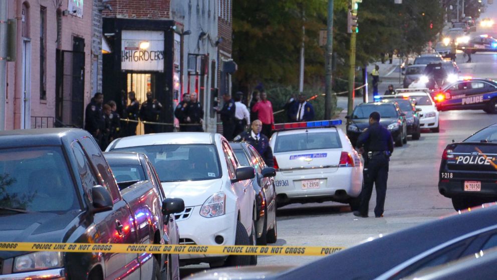 Baltimore police detective dies after being shot in head, manhunt for ...