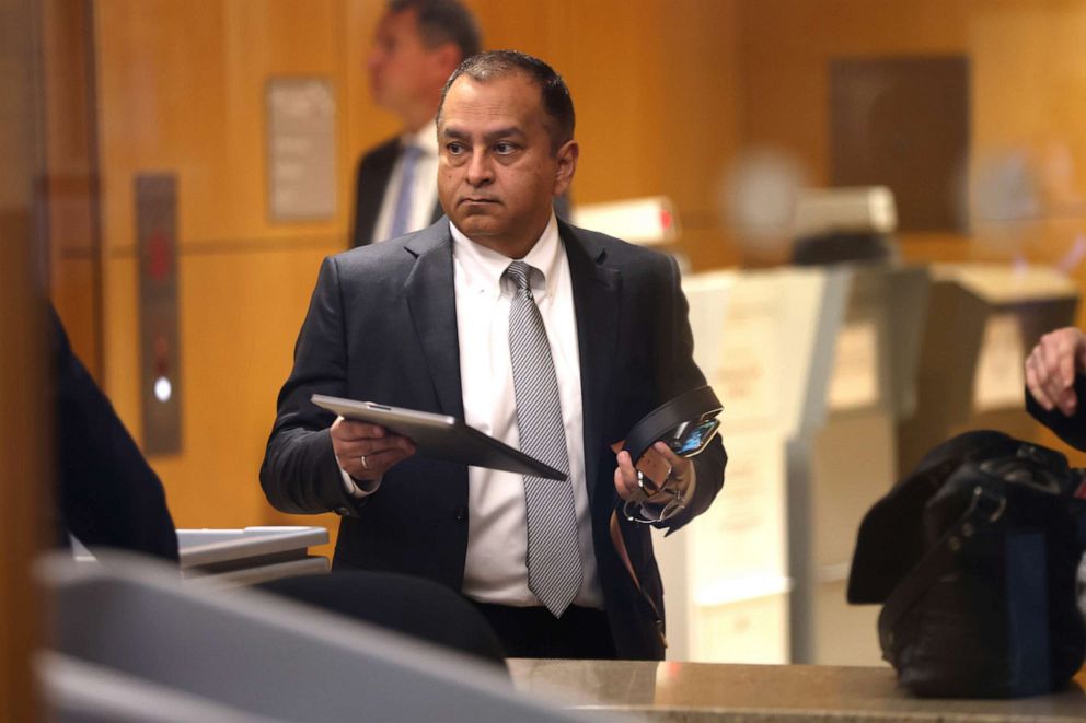 PHOTO: Former Theranos COO Ramesh "Sunny" Balwani goes through a security checkpoint as he arrives at the Robert F. Peckham U.S. Federal Court, March 16, 2022, in San Jose, Calif.