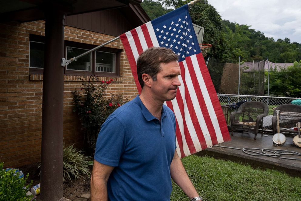PHOTO: Kentucky Governor Andy Beshear visits a house with flood damage in the city, July 31, 2022, in Whitesburg, Ky. 