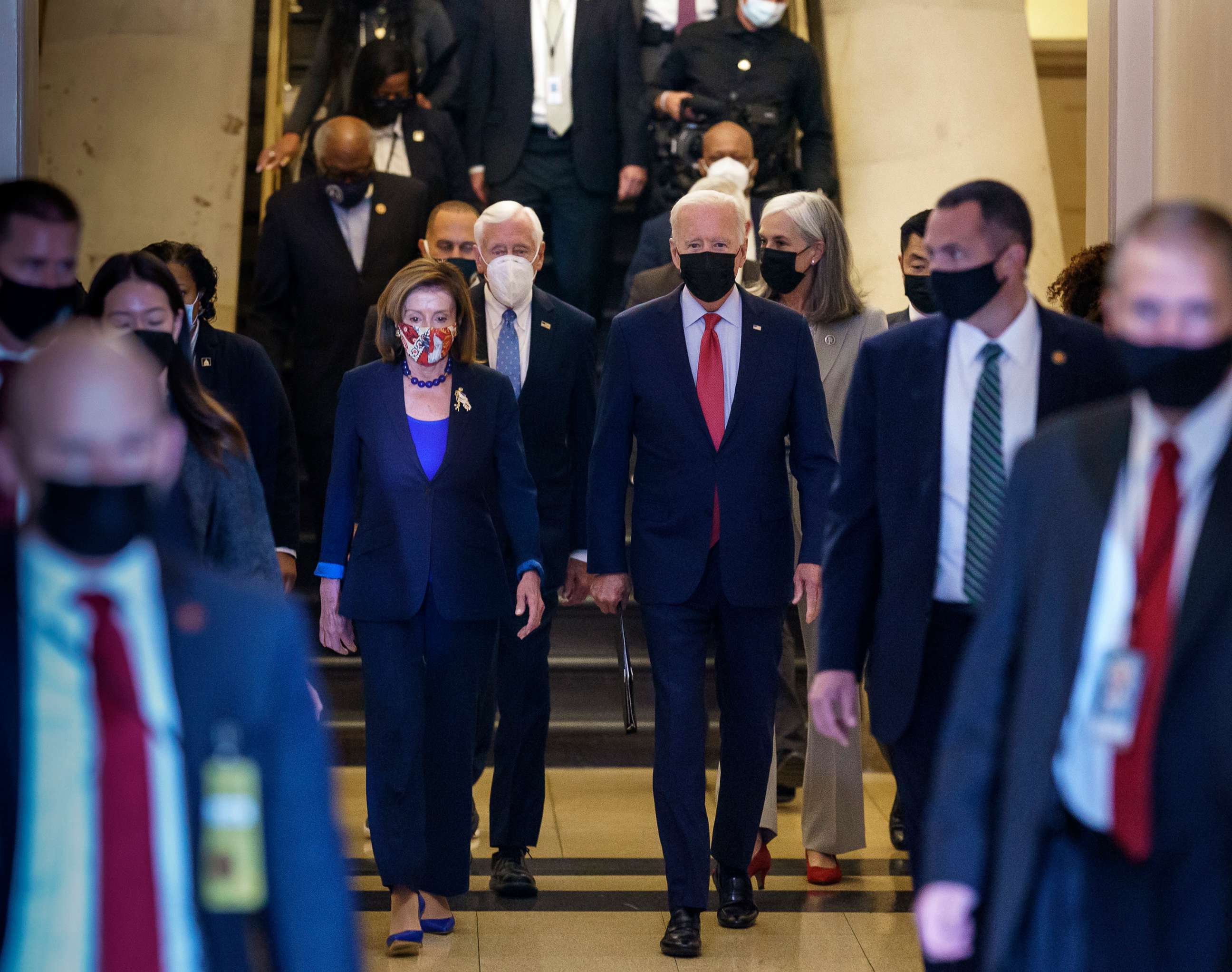 PHOTO: Speaker of the House Nancy Pelosi and President Joe Biden arrive to meet with House Democrats to rescue his social and economic agenda that has been threatened by the progressive wing of the party, at the Capitol, Oct. 1, 2021.