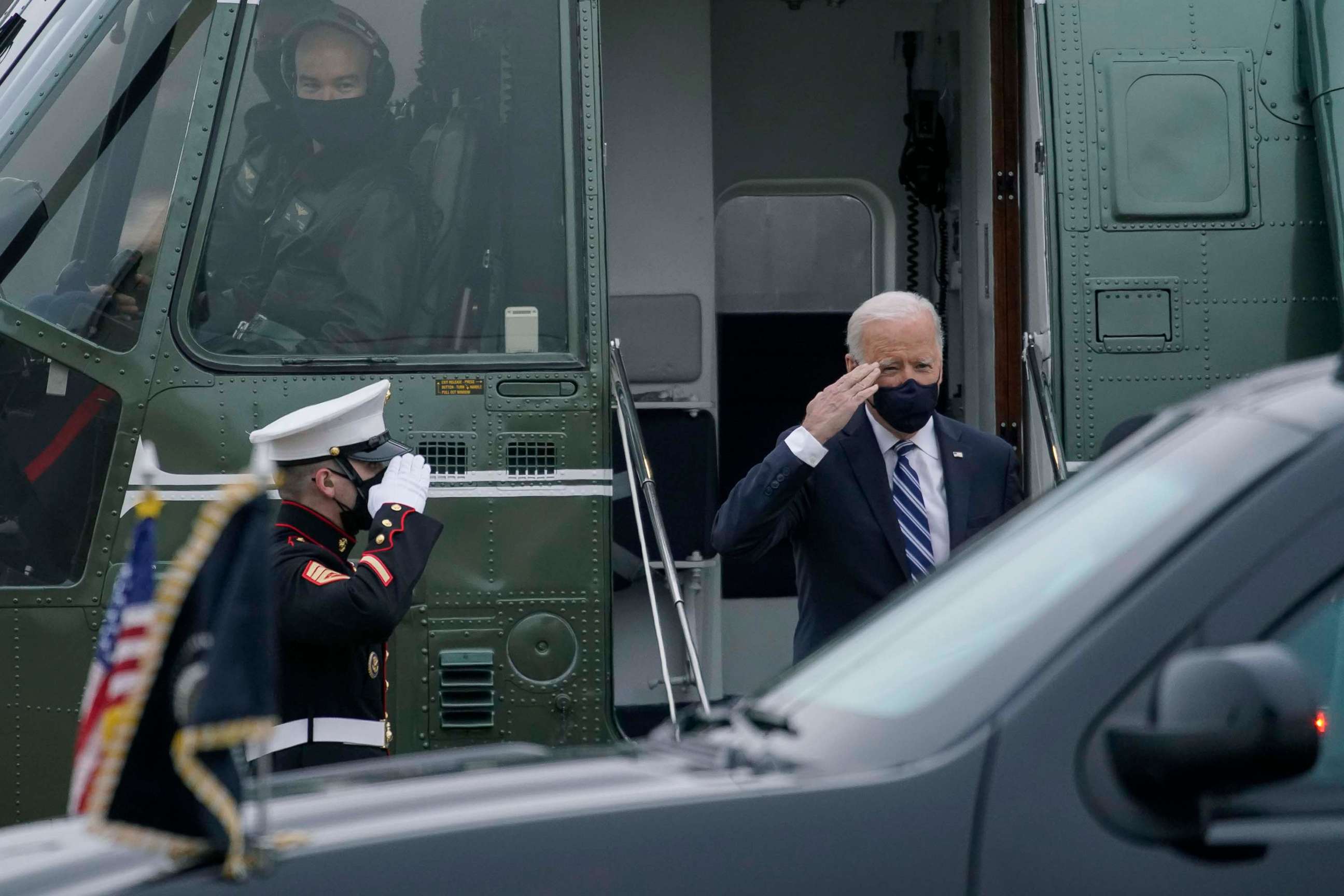 PHOTO: President Joe Biden salutes as he arrives on Marine One at Delaware Air National Guard Base in New Castle, Del., March 16, 2021, en route to Wilmington, Del. 