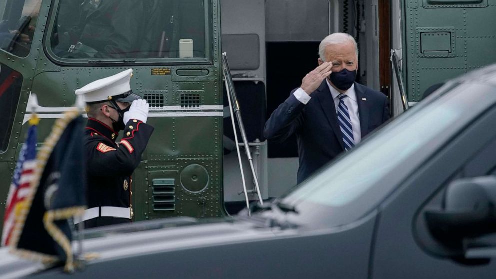 PHOTO: President Joe Biden salutes as he arrives on Marine One at Delaware Air National Guard Base in New Castle, Del., March 16, 2021, en route to Wilmington, Del. 