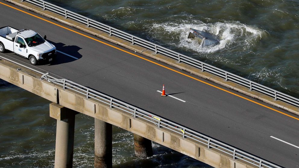 The Coast Guard interrupts the search for people in the water after a semi-trailer accident on the Chesapeake Bay Bridge